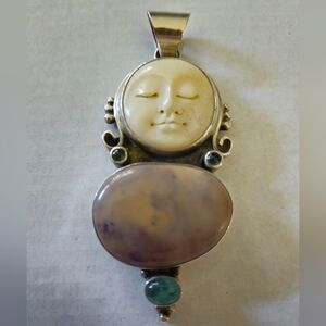 Large Sterling Silver Pendant With Carved Bone Face